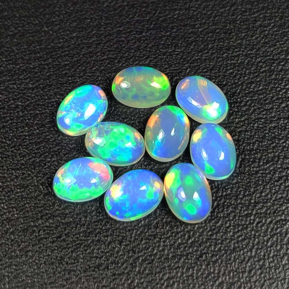 4.90 Ct Natural Multicolor Welo Opal OVal Cab Set (1 of 3)