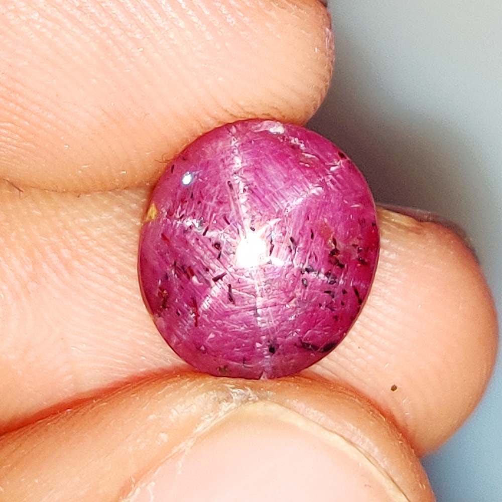 8.75 Ct Natural Six Line Star Ruby Oval Cab: Weight - 8.75 Ct / Size - 11.00 x 10.00 x 6.60 mm / Shape - Oval Cabochon / Clarity - Opaque / Origin - India / Treatment - None