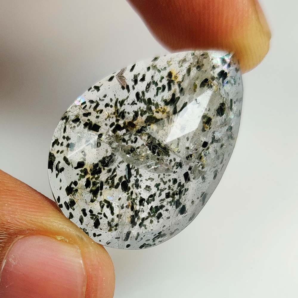 24.54 Ct Natural Rutile Quartz Pear Cut: Weight - 24.54 Ct / Dimensions - 30.00 x 20.00 x 6.80 mm / Shape & Cut - Pear Cut / Transparency - Transaprent / Origin - Norway / Comments - None