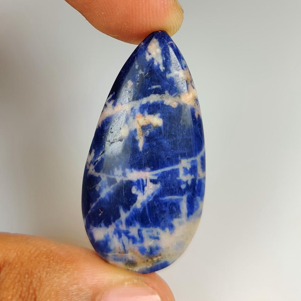 29.38 Ct Natural Blue Sodalite Pear Cab (1 of 2)