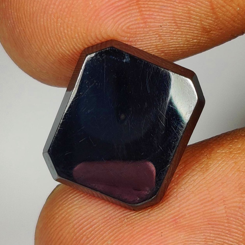 9.72 Ct Natural Gun Metal Quartz Octagon cab: Weight - 9.72 Ct / Dimensions - 13.70 x 11.80 x 3.00 mm / Shape & Cut - Octagon cab / Transparency -Opaque / Origin - Brazil