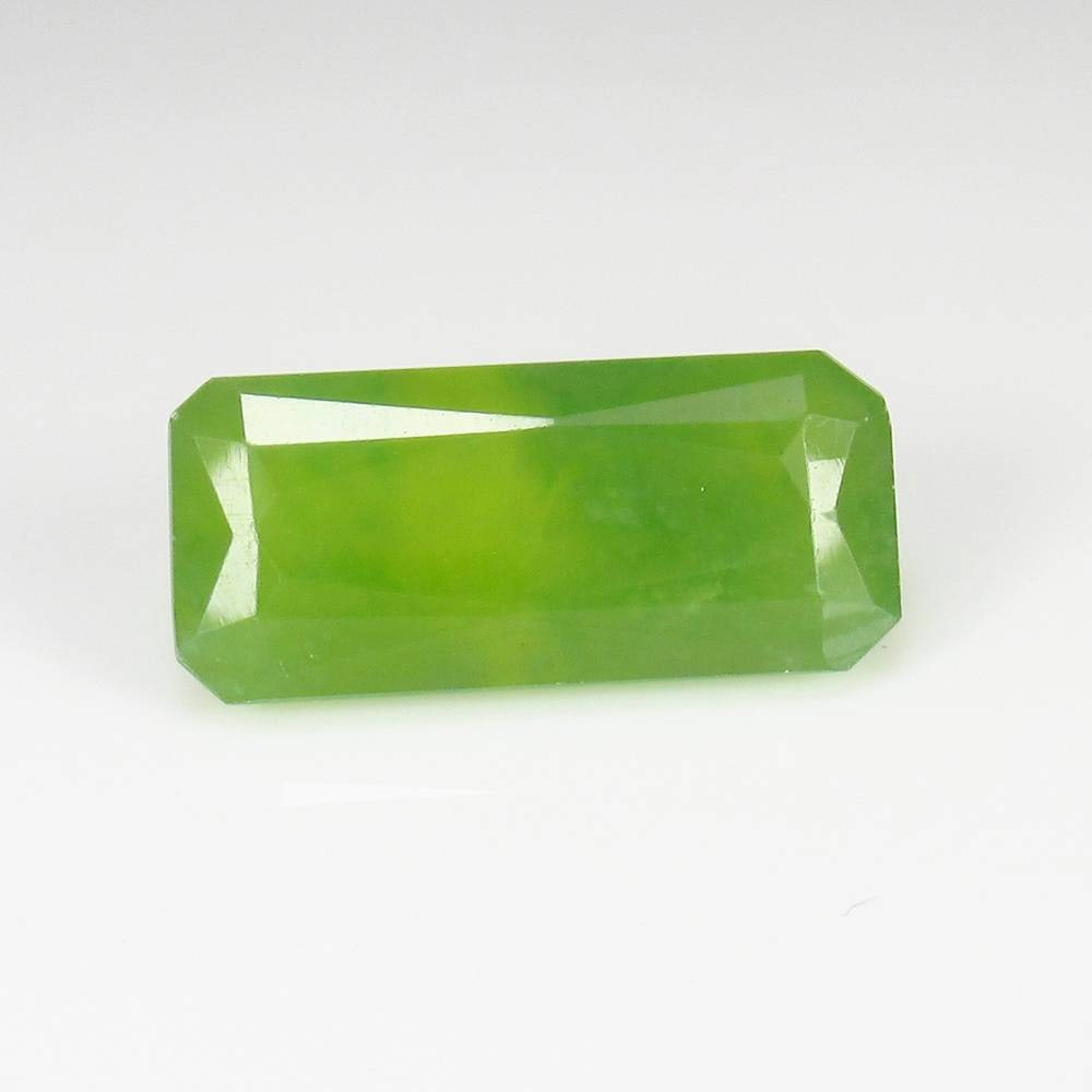 12.18 Ct Natural Grossular Garnet Long Rectangle Cut: Weight - 12.18 Ct / Dimensions - 19.90 x 9.20 x 7.00 mm / Shape - Rectangular Cut / Clarity - SI / Origin - Nigeria / Treatment - None