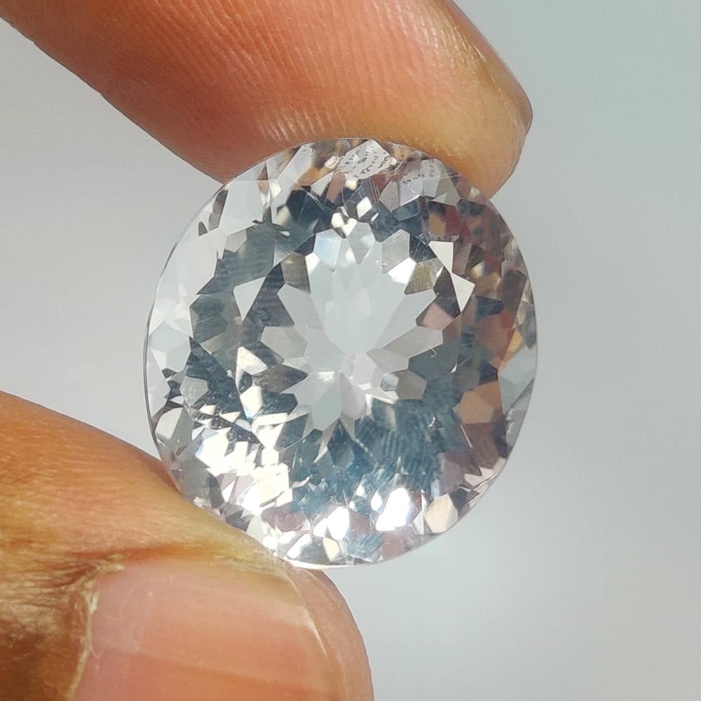 16.15 Ct Natural Colorless Quartz Oval Cut: Weight - 16.15 Ct / Dimensions - 17.30 x 15.70 x 11.20 mm / Shape & Cut - Oval Cut / Color - White / Clarity - VVS / Origin - Brazil / Comments - None