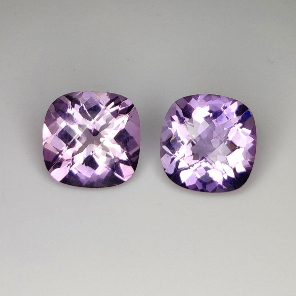 11.20 Ct Natural Purple Amethyst Cushion Cut Pair: Weight - 11.20 Ct / Dimensions - 12.00 - 12.10 mm / 2 Pc's / Shape - Cushion Cut / Color - Purple / Clarity - VVS / Origin -Brazil / Treatment - Heated