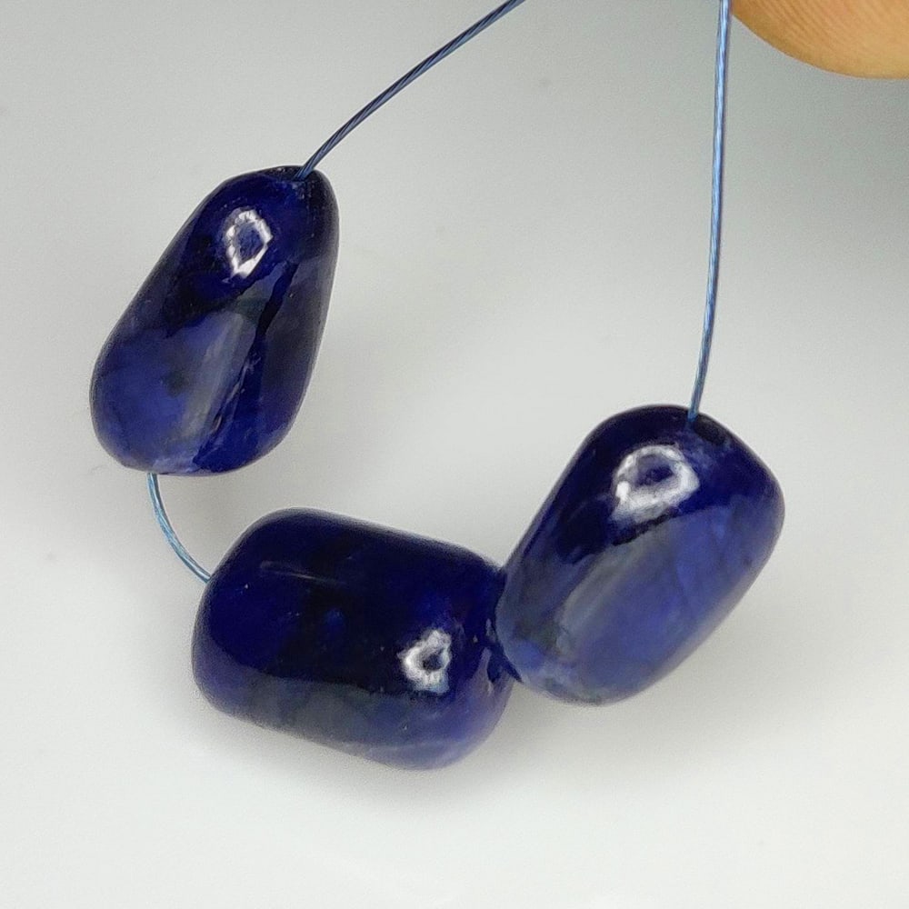 23.38 Ct Natural Blue Sapphire Dumbbell Beads (1 of 2)