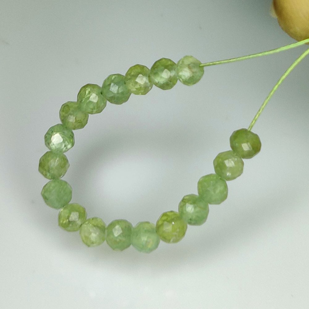 3.59 Ct Natural Green Prehnite Round Cut Beads: Weight - 3.59 Ct / Dimensions - 3.00 - 3.20 mm / 18 Pc's / Shape & Cut - Round Cut Beads / Transparency - Semi Transaprent / Origin - Brazil / Comments - None