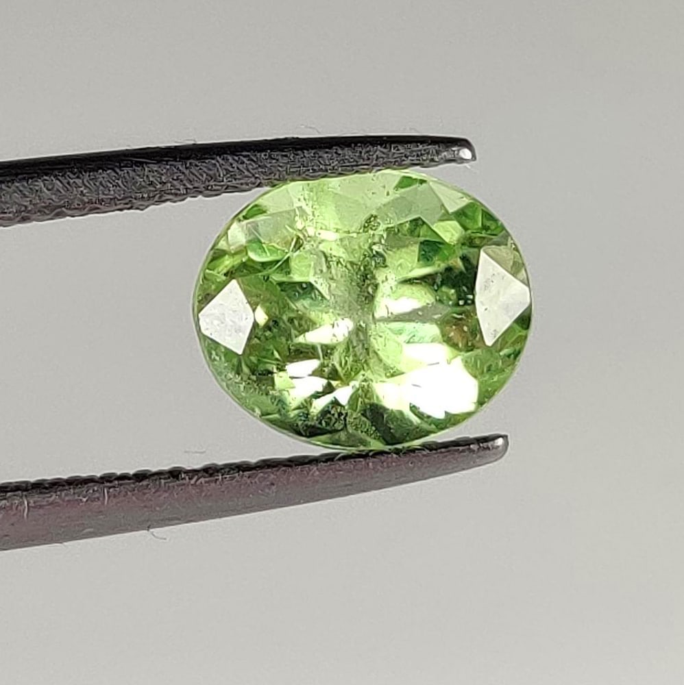 2.27 Ct Natural Green Peridot Oval Cut: Weight - 2.27 Ct / Dimensions - 8.50 x 7.50 x 5.20 mm / Shape - Oval Cut / Color - Green / Clarity - VVS / Origin - Pakistan / Comments - None