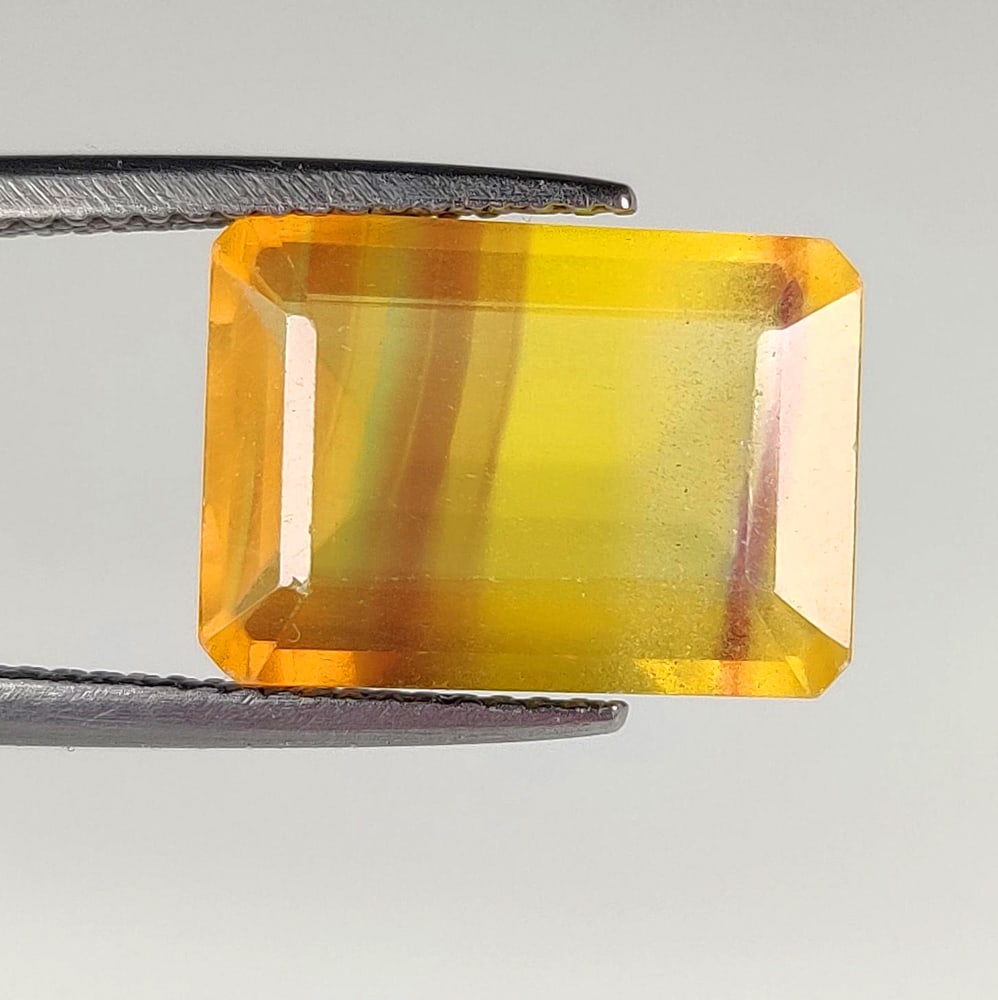 8.41 Ct Natural Multicolor Flourite Emerald Cut (1 of 2)