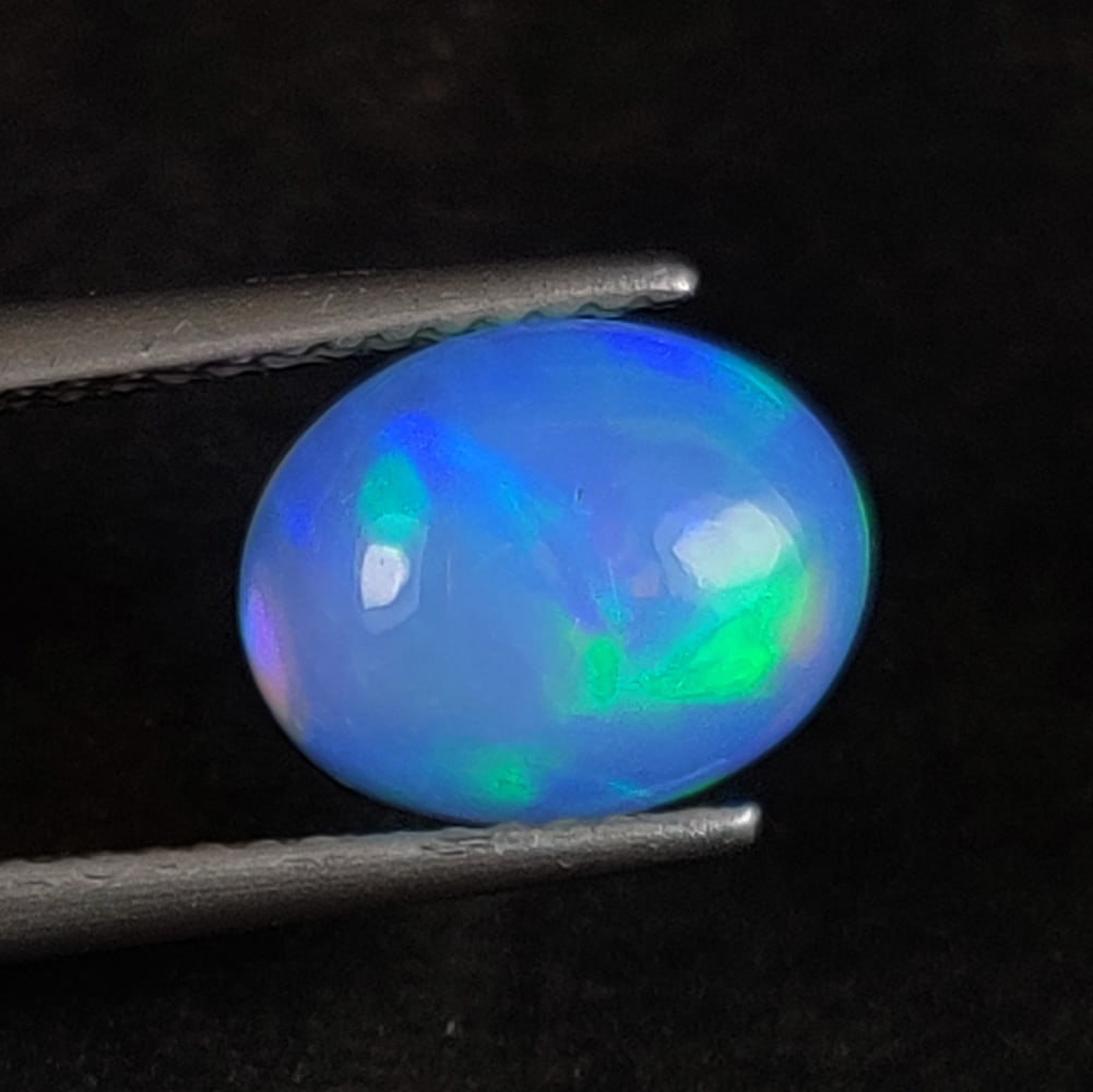 1.67 Ct Natural Multicolor Welo Opal Flash Fire Oval Cab (1 of 3)