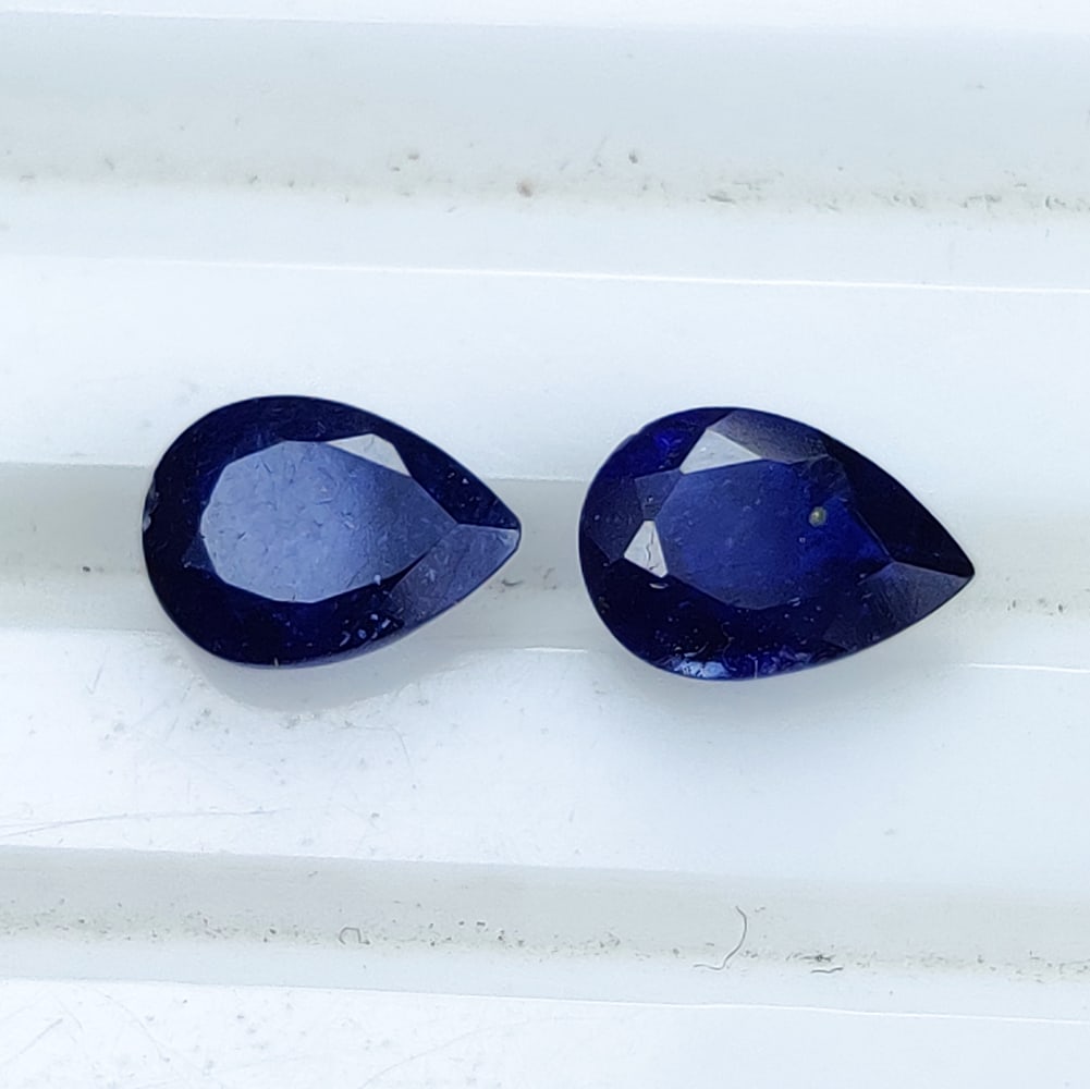 1.92 Ct Natural Blue Sapphire Pear Cut Pair: Weight - 1.92 Ct / Size- 6.90 x 5.10 x 3.10 mm / 2 Pc's / Shape - Pear Cut / Clarity - SI / Origin - Sri Lanka / Treatment - Diffussed