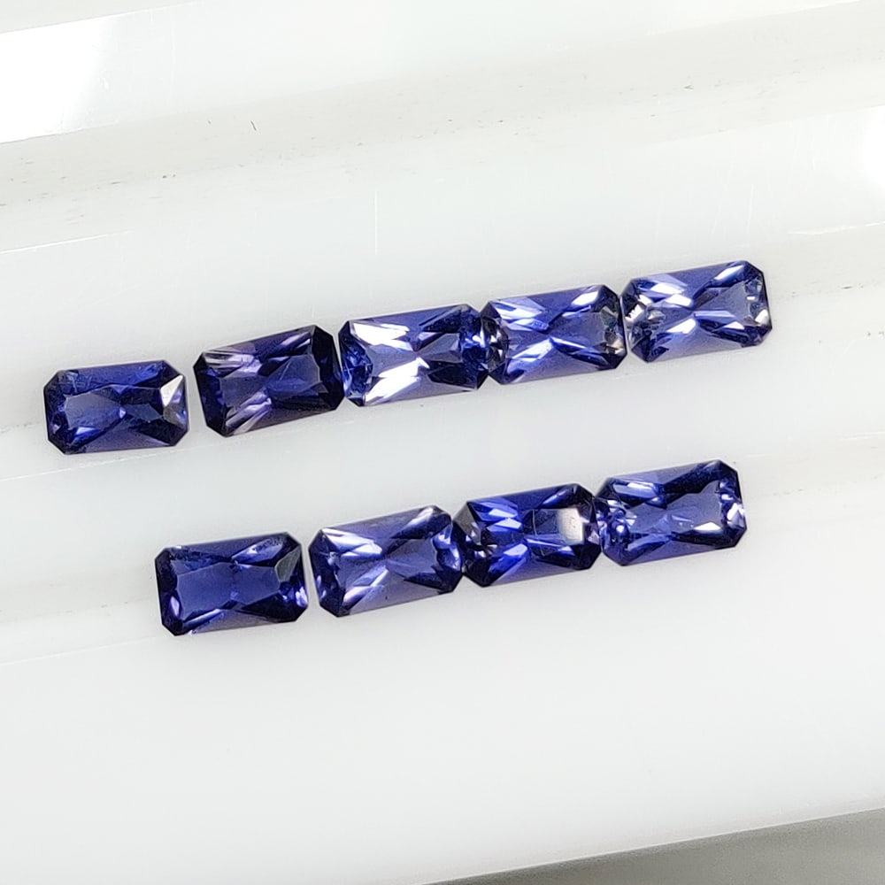 1.91 Ct Natural Iolite Octagon Cut Set: Weight - 1.91 Ct / Dimensions - 5.0x3.0 - 5.1x3.1 mm / 7 Pc's / Shape - Octagon Cut / Color - Violet / Clarity - VVS / Origin - Brazil / Treatment - None