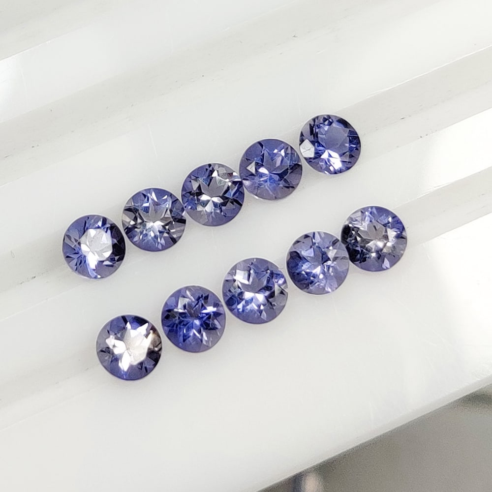 2.08 Ct Natural Violet-Blue Iolite Round Cut Set: Weight - 2.08 Ct / Dimensions - 4.00 - 4.10 mm / 10 Pc's / Shape - Round Cut / Color - Violet / Clarity - VVS / Origin - Brazil / Treatment - None