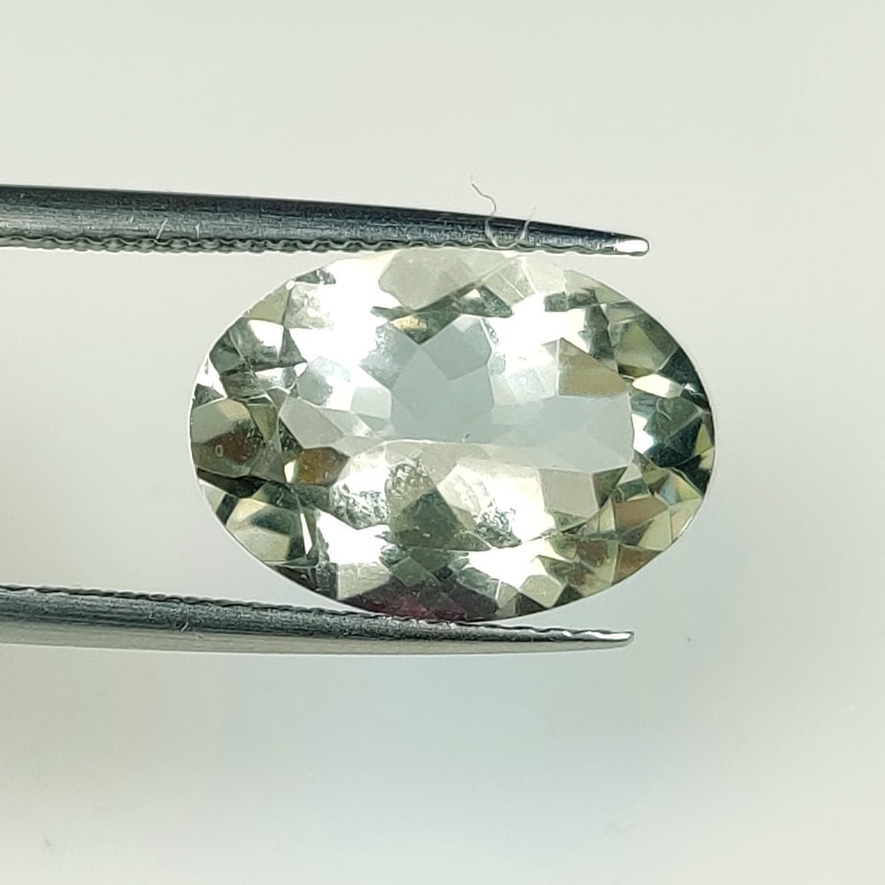 5.15 Ct Natural Green Amethyst Oval Cut: Weight - 5.15 Ct / Dimensions - 14.20 x 10.10 x 6.60 mm / Shape - Oval Cut / Color - Green / Clarity - VVS / Origin -Brazil / Treatment - Heated