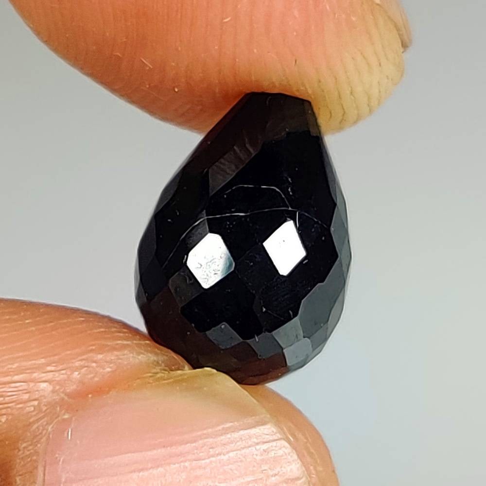 6.78 Ct Natural Black Onyx Pear Drop: Weight - 6.78 Ct / Size - 11.20 x 8.10 x 8.10 mm / Shape - Pear Drop / Clarity - Opaque / Origin - Brazil / Treatment - None