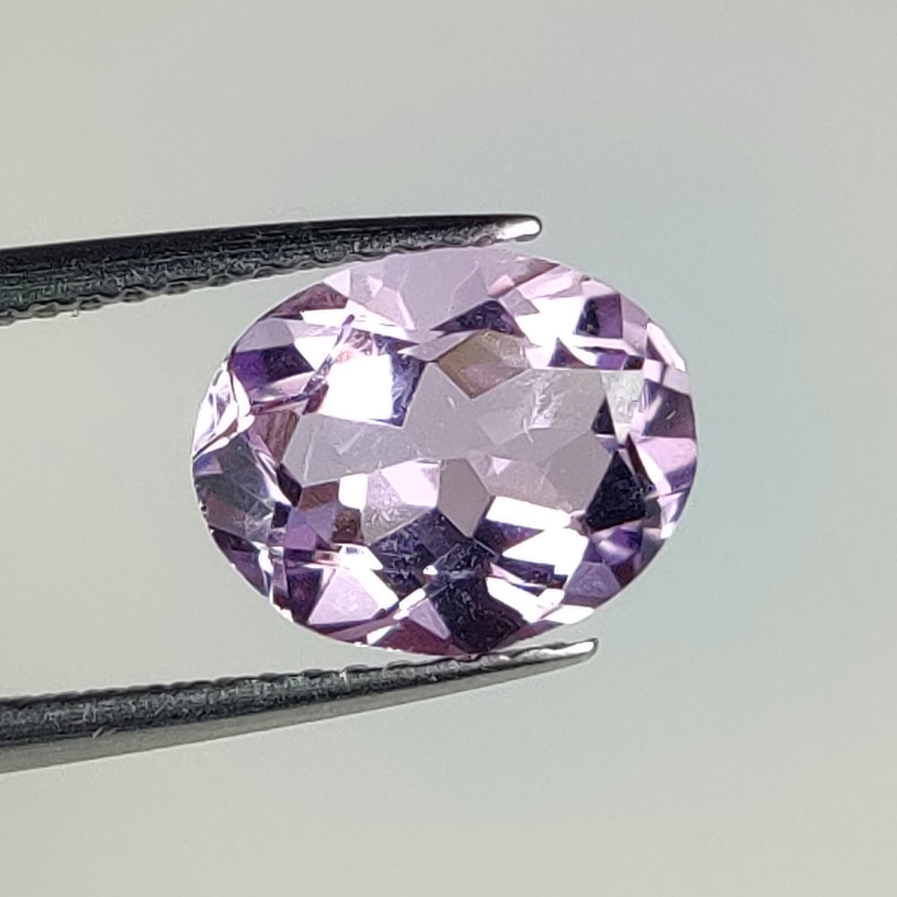 2.03 Ct Natural Pink Amethyst Oval Cut: Weight - 2.03 Ct / Dimensions - 9.80 x 7.90 x 5.00 mm / Shape - Oval Cut / Color - Pink / Clarity - VVS / Origin - Brazil / Comments - Heated