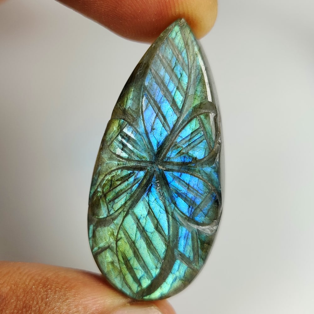 50.29 Ct Natural Blue Shaded Labradorite Pear Art Cab: Weight - 50.29 Ct / Size - 42.00 x 19.60 x 7.60 mm / Shape - Excellent Pear Cab / Clarity - Opaque / Origin - Africa / Treatment - None
