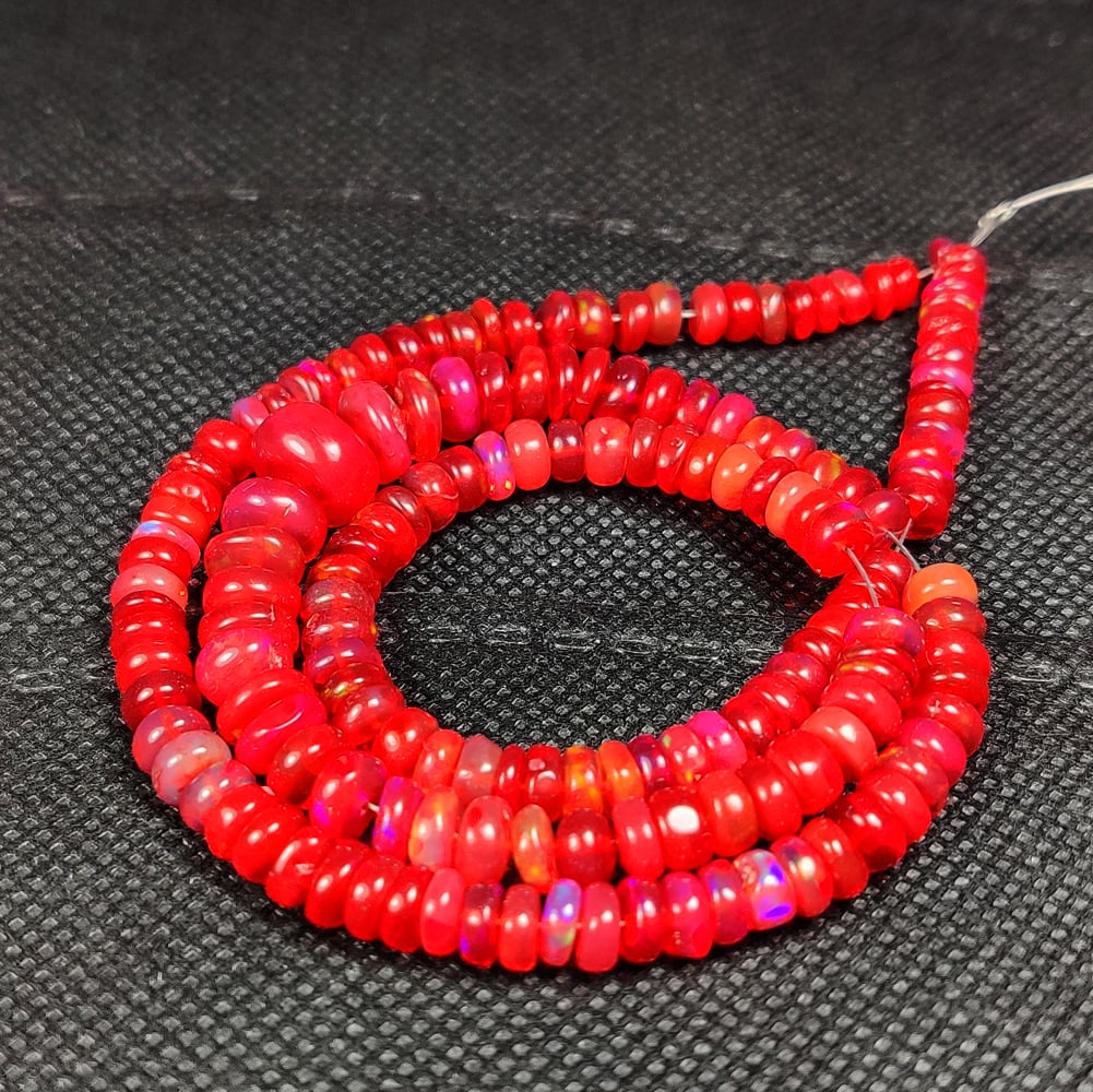 65.39 Ct Natural Orange Fire Opal Round Beads: Weight - 65.39 Ct / Dimensions - 4.50 - 9.70 mm / 59 Pc's / 16" inches / Shape - Round Beads / Color - Transparent / Clarity - Transparent / Origin - Ethiopia / Treatment - Color Heated