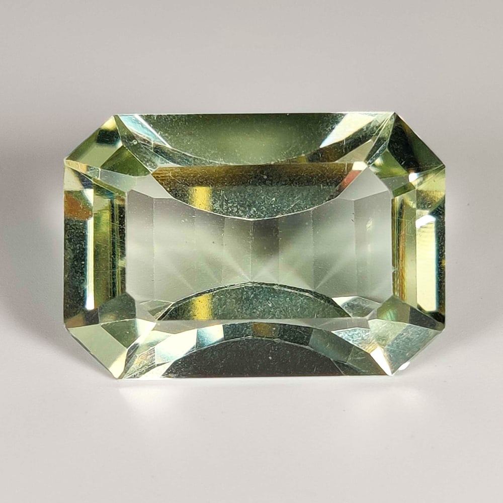 35.24 Ct Natural Green Amethyst Octagon Cut: Weight - 35.24 Ct / Size - 27.00 x 18.00 x 11.00 mm / Shape - Octagon Cut / Color - Green / Clarity - VVS / Origin - Brazil / Treatment - Heated