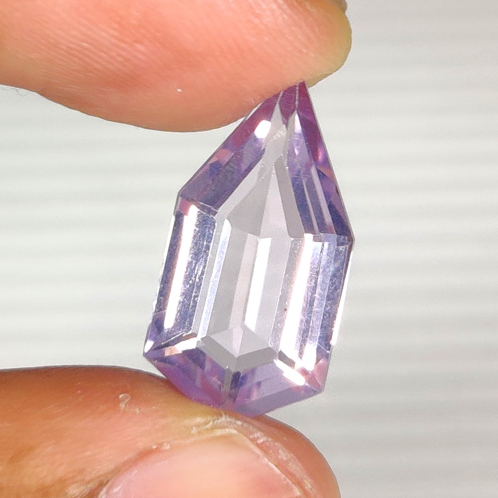 7.03 Ct Natural Lavender Amethyst Fancy Cut: Weight - 7.03 Ct / Size - 20.10 x 10.00 x 6.40 mm / Shape - Fancy Cut / Color - Lavender / Clarity - VVS / Origin -Brazil / Treatment - Heated