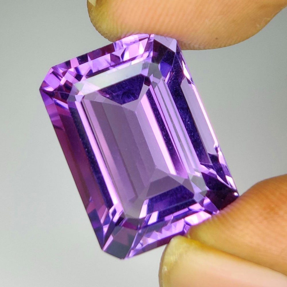 15.63 Ct Natural Purple Amethyst Octagon Cut: Weight - 15.63 Ct / Dimensions - 18.00 x 13.00 x 9.20 mm / Shape - Octagon Cut / Color - Purple / Clarity - VVS / Origin -Brazil / Treatment - Heated