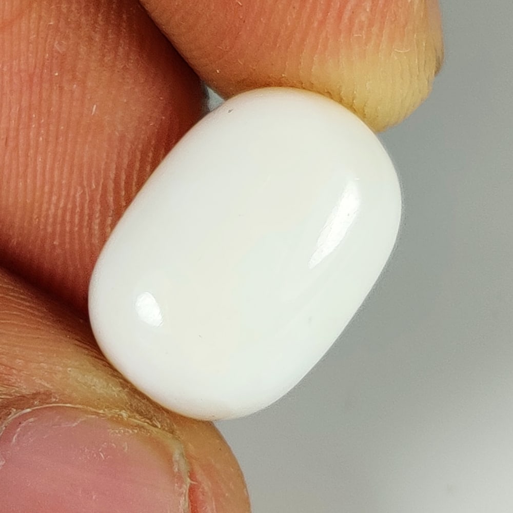 8.31 Ct Natural White Opal Oval Cab (1 of 2)