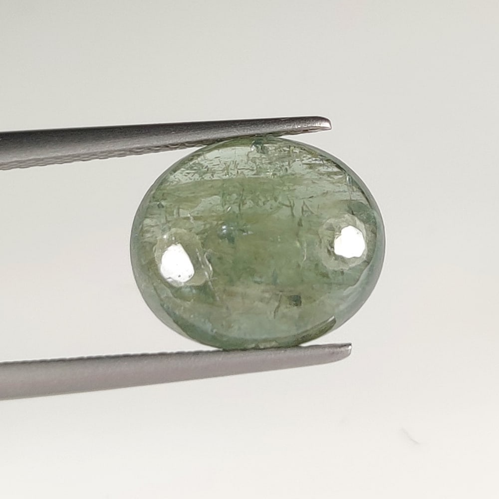 5.13 Ct Natural Rutile Quartz Oval Cab: Weight - 5.13 Ct / Dimensions - 12.40 x 10.50 x 4.60 mm / Shape & Cut - Oval Cab / Transparency - Transparent / Origin - Norway / Comments - None