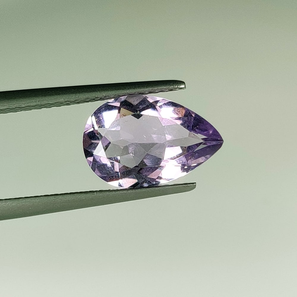 2.58 Ct Natural Purple Amethyst Pear Cut: Weight - 2.58 Ct / Dimensions - 12.10 x 8.10 x 4.80 mm / Shape - Pear Cut / Color - Purple / Clarity - VVS / Origin -Brazil / Treatment - Heated