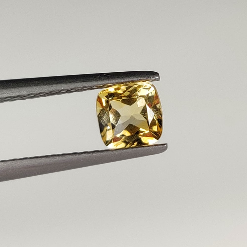0.76 Ct Natural Citrine Cushion Cut: Weight - 0.76 Ct / Dimensions - 5.30 x 5.20 x 4.20 mm / Shape & Cut - Cushion Cut / Color - Yellow / Transparency - VVS / Origin - Brazil / Comments - Heated