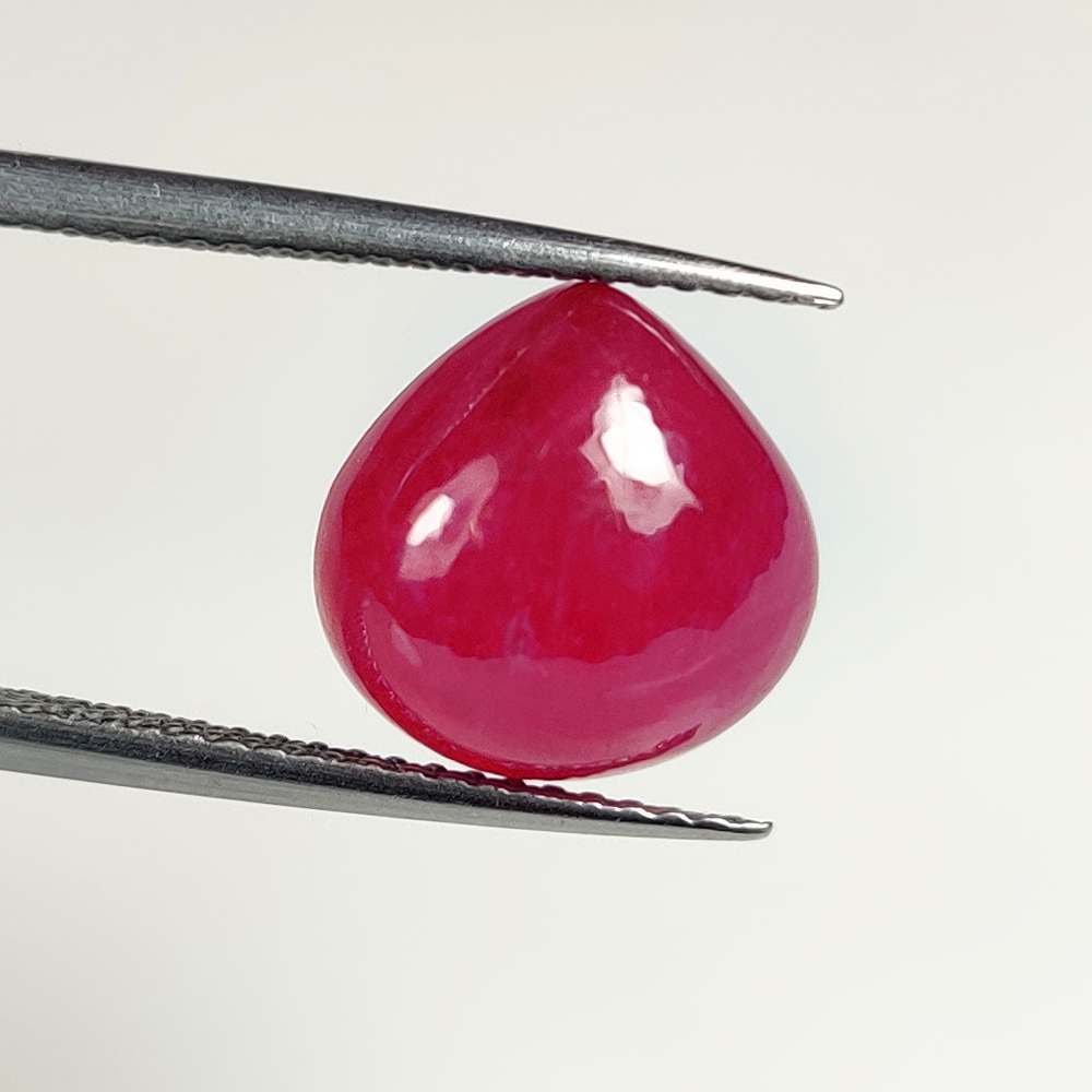 8.35 Ct Natural Pinkish Red Ruby Pear Cab: Weight - 8.35 Ct / Size - 10.80 x 10.80 x 7.00 mm / Shape - Pear Cab / Color - Pinkish Red / Clarity - SI / Origin - Mozambique / Treatment - Color Enhanced by Glass Filling
