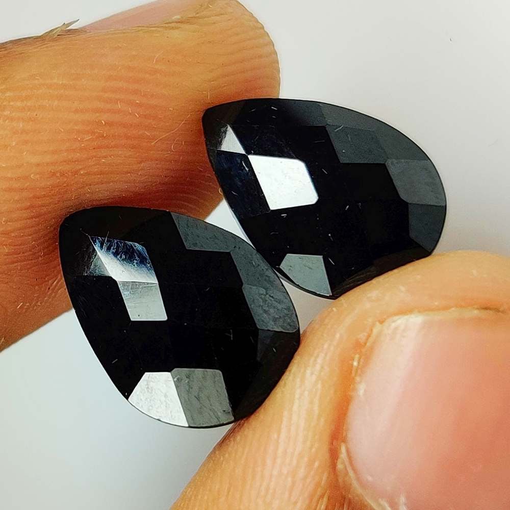 8.72 Ct Natural Black Onyx Pear Cut Pair: Weight - 8.72 Ct / Dimensions - 13.70 x 9.60 x 4.30 mm / 2 Pc's / Shape - Pear Cut / Color - Black / Clarity - OPaque / Origin - Brazil / Treatment - None