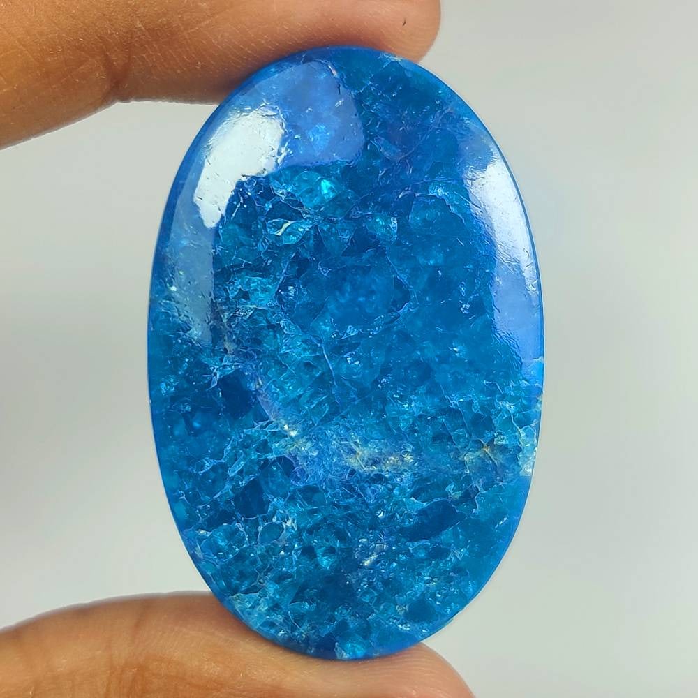 42.89 Ct Natural Blue Apatite Oval Cab (1 of 2)