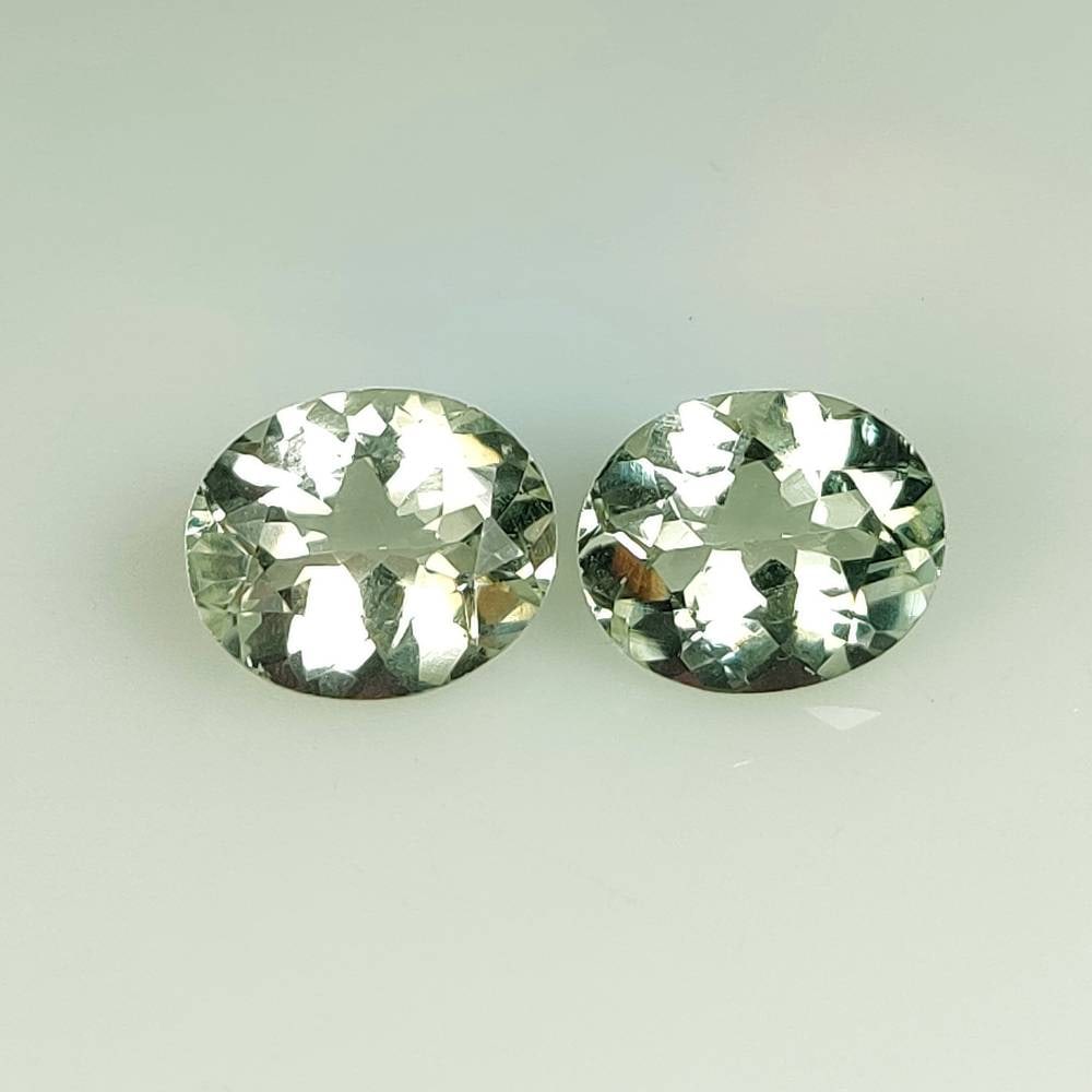 7.93 Ct Natural Green Amethyst OVal Cut Pair: Weight - 7.93 Ct / Size - 12.10 x 10.10 x 6.10 mm / 2 PC's / Shape - Oval Cut / Color - Green / Clarity - VVS / Origin - Brazil / Treatment - Heated