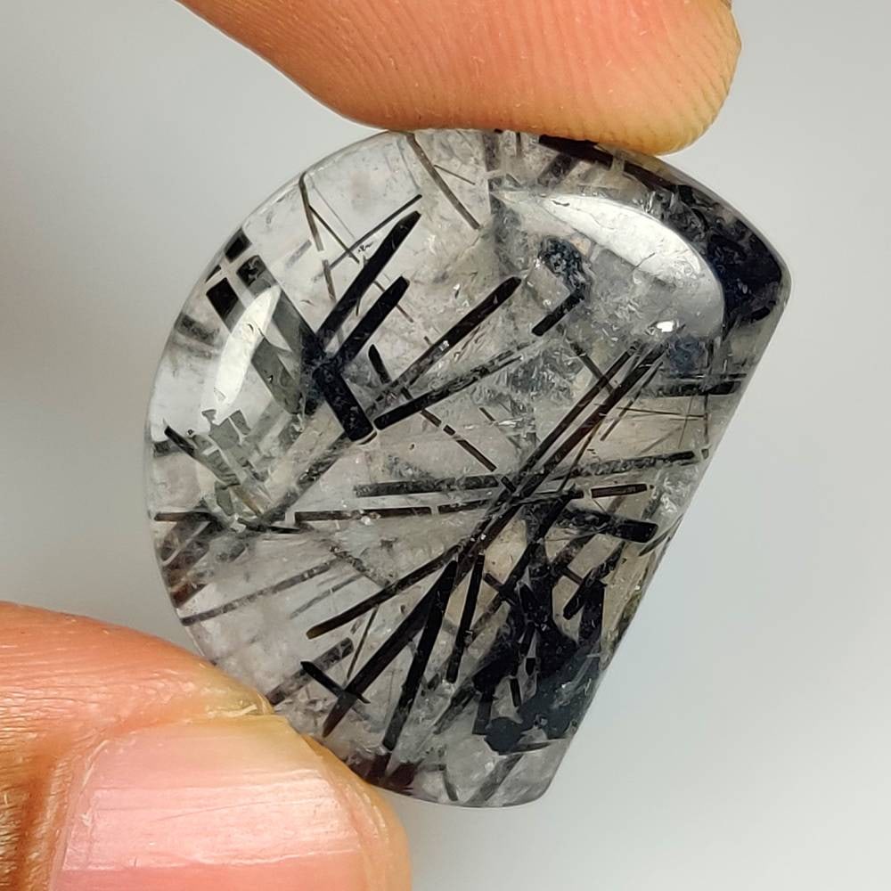 27.46 Ct Natural Rutile Quartz Fancy Cab: Weight - 27.46 Ct / Dimensions - 25.00 x 19.30 x 6.30 mm / Shape & Cut - Fancy Cab / Transparency - Transaprent / Origin - India / Comments - None