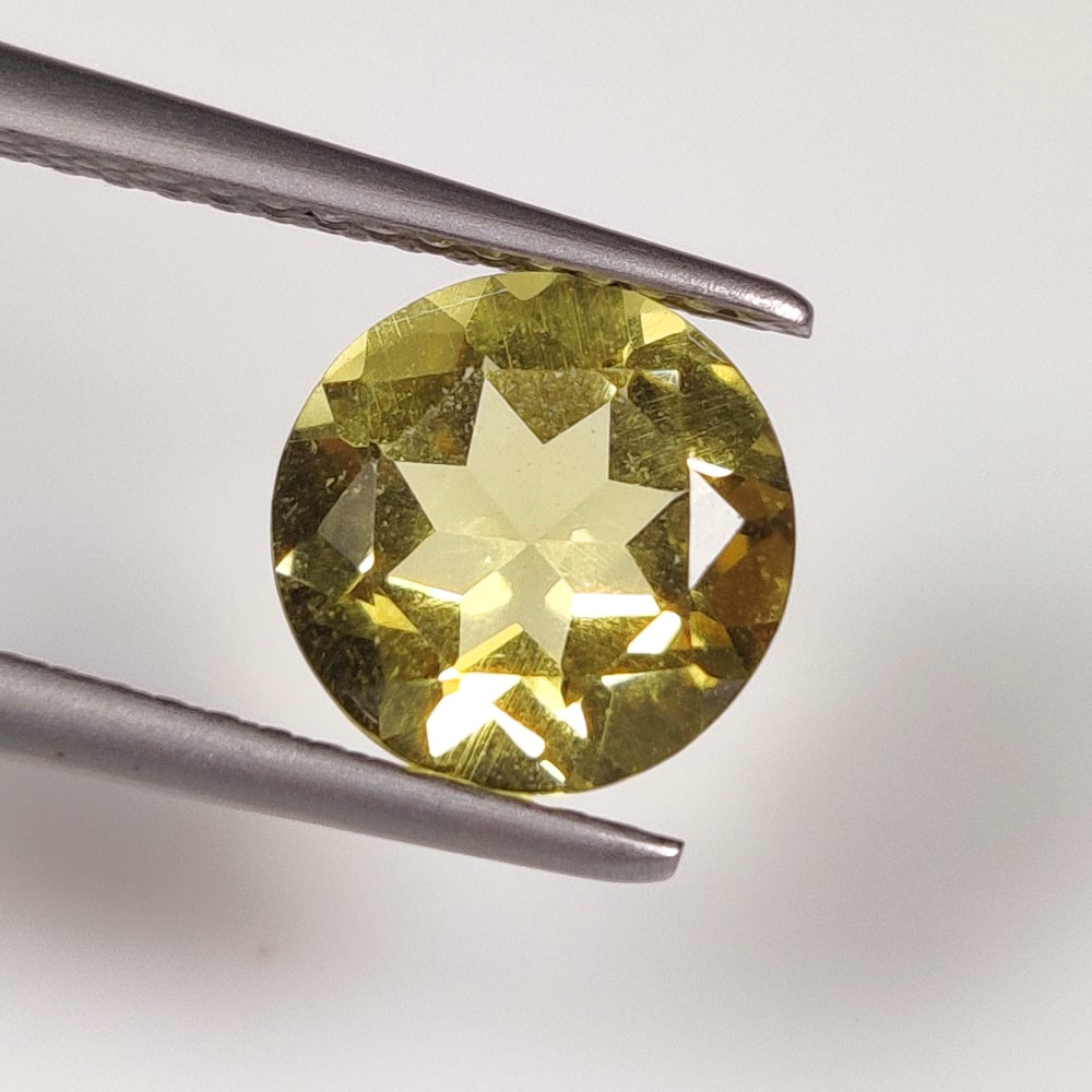 1.77 Ct Natural Yellow Citrine Round Cut: Weight - 1.77 Ct / Size - 8.30 x 8.30 x 5.00 mm / Shape - Round Cut / Color - Yellow / Clarity - VVS / Origin - Brazil / Treatment - Heated