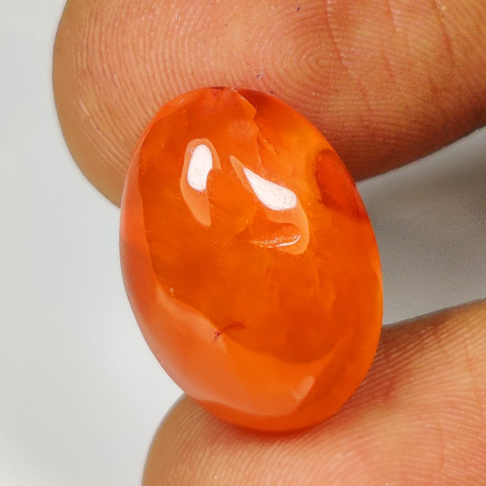10.81 Ct Natural Orange Carnelian Oval Cab (1 of 2)