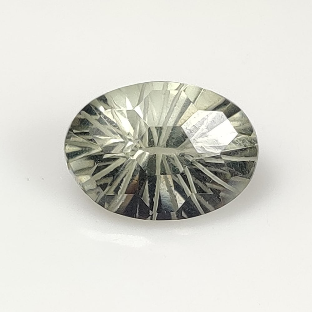 5.59 Ct Natural Green Amethyst Oval Football Cut: Weight - 5.59 Ct / Size - 14.10 x 10.00 x 7.70 mm / Shape - OVal Cut / Color - Green / Clarity - VVS / Origin - Brazil / Treatment - Heated