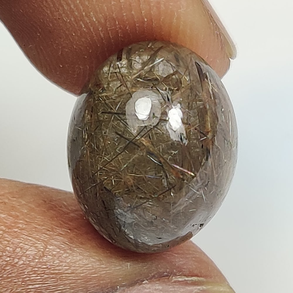 9.33 Ct Natural Rutile Quartz Oval Cab: Weight - 9.33 Ct / Dimensions - 14.50 x 11.60 x 8.00 mm / Shape & Cut - Oval Cab / Transparency - Transaprent / Origin - Norway / Comments - None