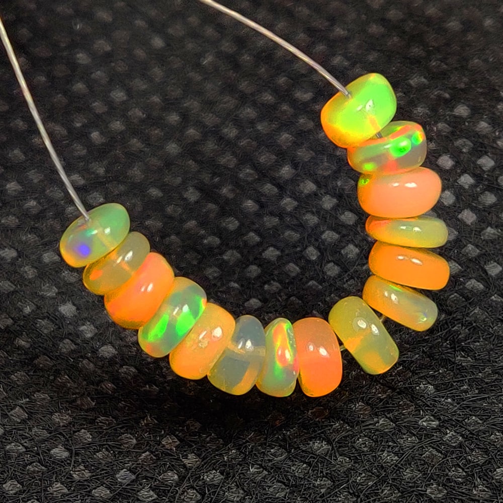 3.58 Ct Natural Multicolor Welo Opal Flash Fire Round Beads (1 of 2)