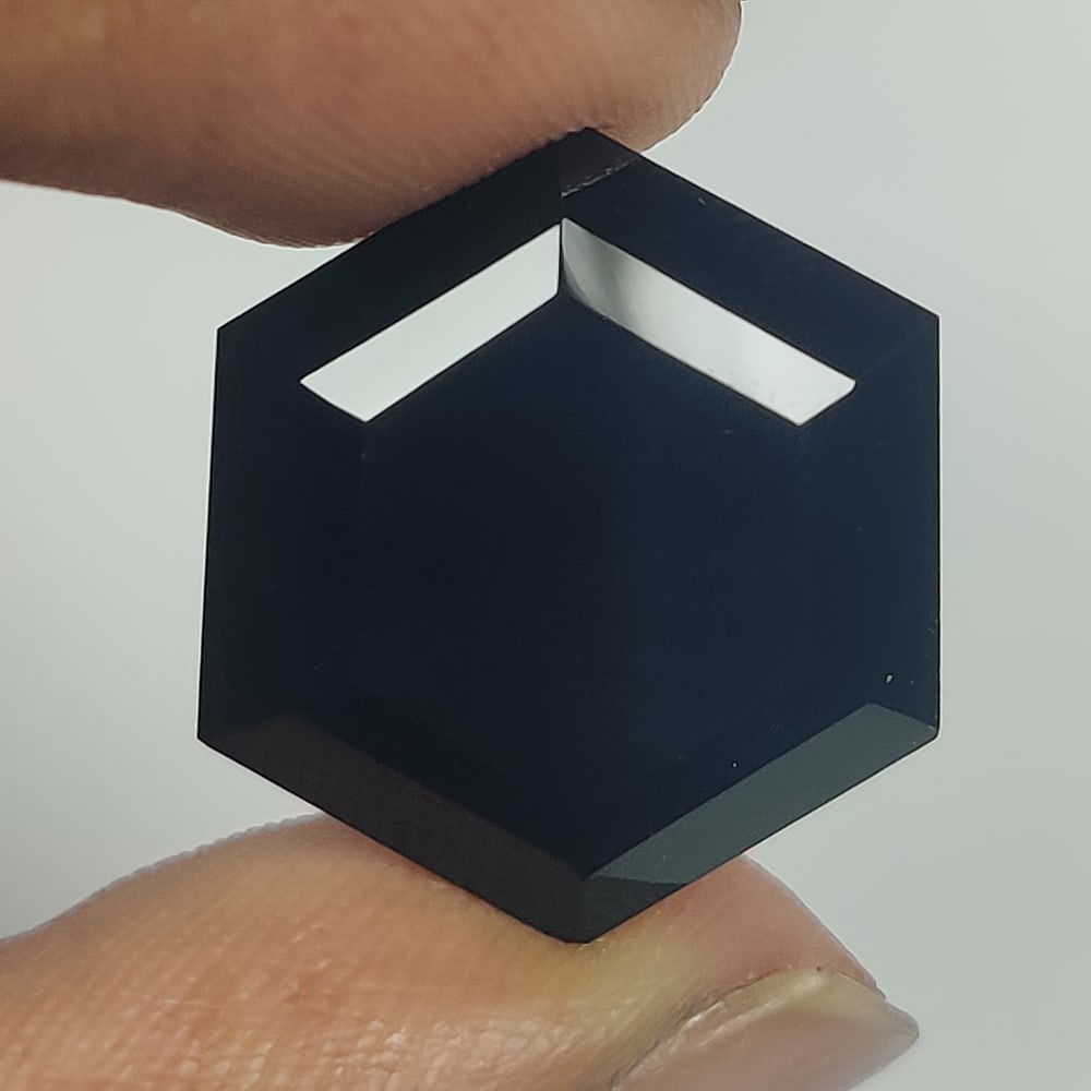 16.17 Ct Natural Black Onyx Hexagon Cut: Weight - 16.17 Ct / Size - 20.60 x 18.30 x 7.60 mm / Shape - Hexagon Cut / Clarity - Opaque / Origin - Brazil / Treatment - None
