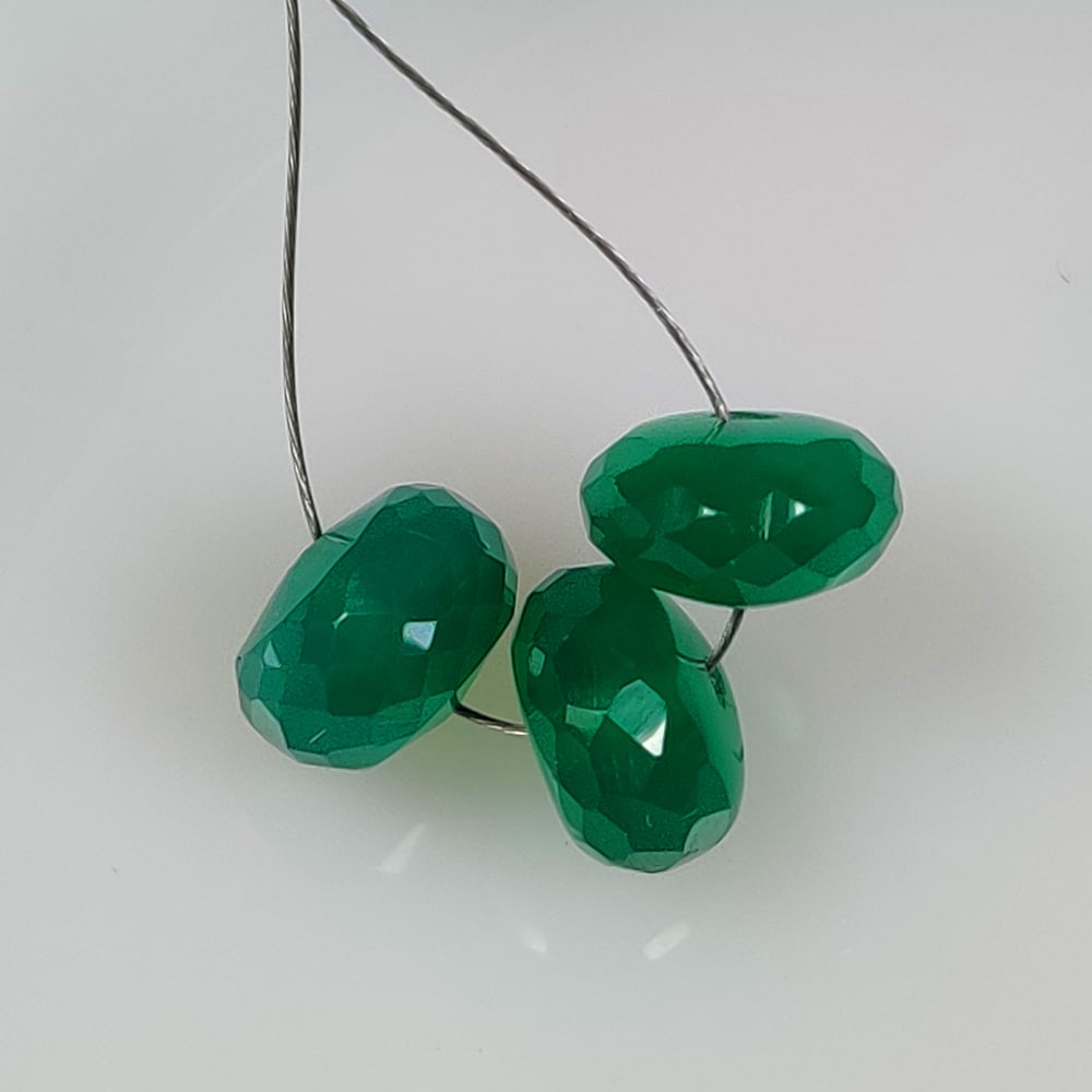 8.67 Ct Natural Green Onyx Round Cut Beads: Weight - 8.67 Ct / Dimensions - 8.50 - 8.70 mm / 3 pc's / Shape - Round Cut Beads / Clarity - Semi Transparent / Origin - Brazil / Treatment - None