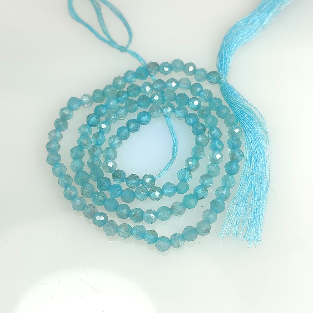 21.86 Ct Natural Blue Apatite Round cut Beads (1 of 2)