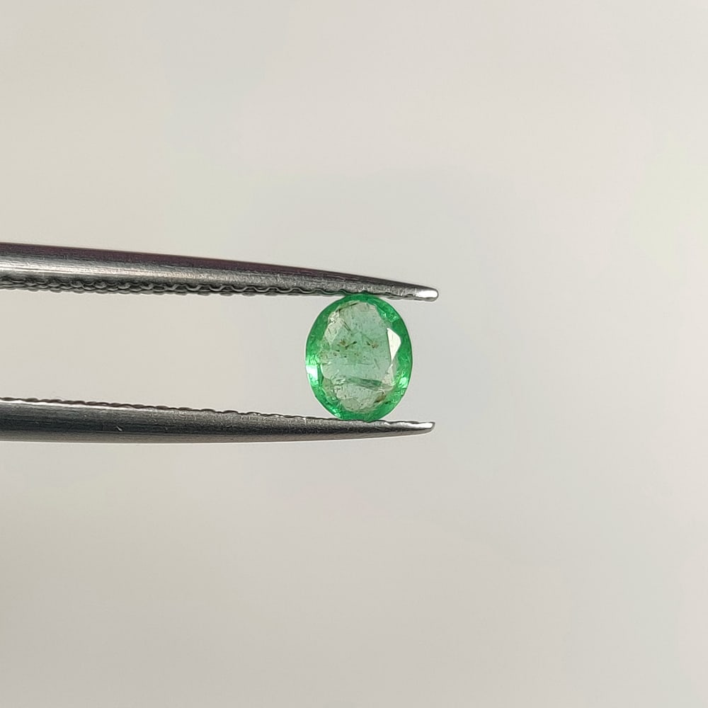 0.27 Ct Natural Zambian Green Emerald Oval Cut: Weight - 0.27 Ct / Dimensions - 4.80 x 4.00 x 2.90 mm / Shape - Oval Cut / Color - Green / Clarity - SI / Origin - Zambia / Treatment - Natural Emeralds are commonly enhanced by oil