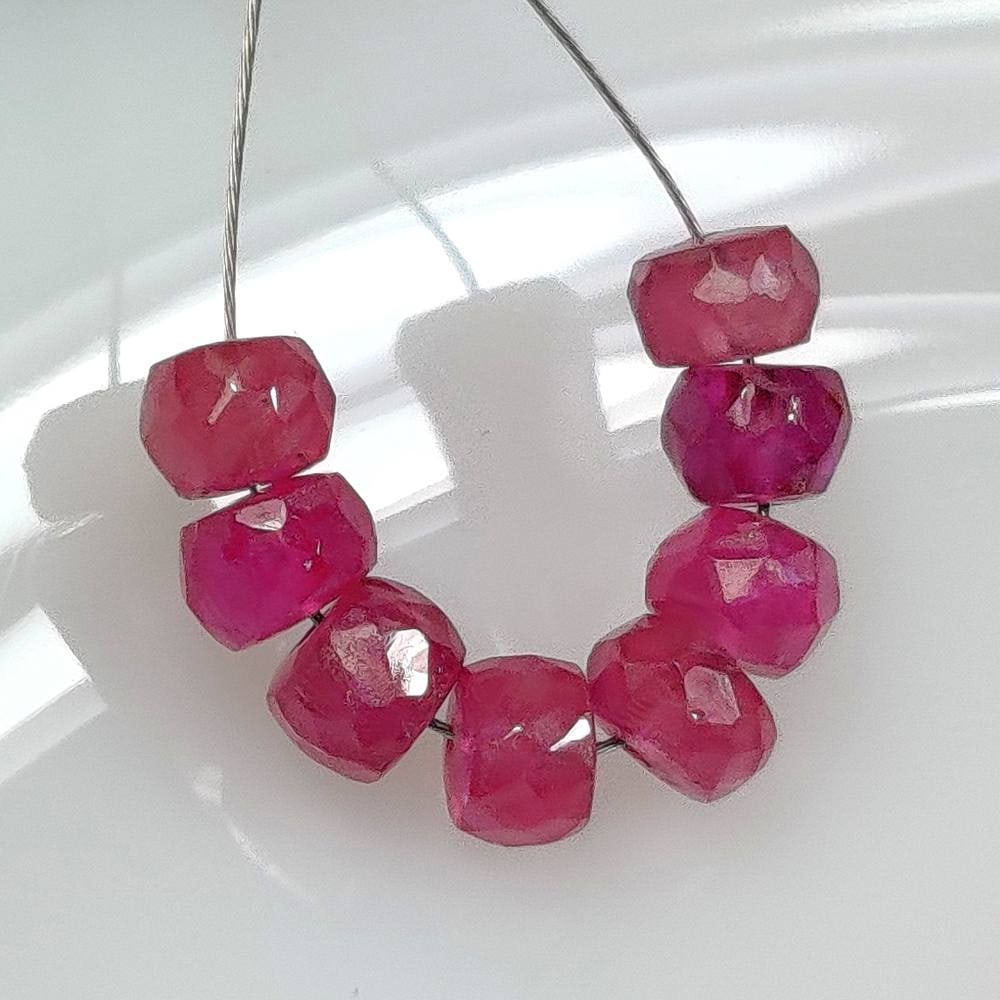 9.16 Ct Natural Red Ruby Round Cut Beads: Weight - 9.16 Ct / Size - 4.70 - 5.20 mm / 8 Pc's / Shape - Round Cut Beads / Color - Red / Clarity - SI / Origin - Mozambique / Treatment - Color Enhanced By Glass Filling