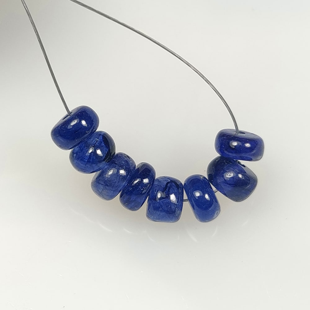 7.27 Ct Natural Blue Sapphire Round Beads: Weight - 7.27 Ct / Dimensions- 5.00 - 5.20 mm / 8 Pc's / Shape - Round Beads / Clarity - SI / Origin - Sri Lanka / Treatment - Standard Heated