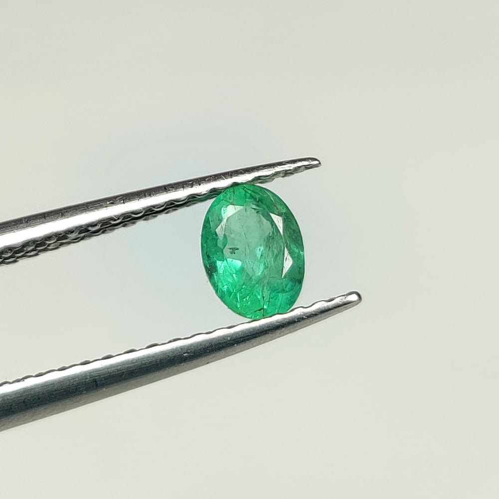 0.38 Ct Natural Zambian Green Emerald Oval Cut: Weight - 0.38 Ct / Dimensions - 5.20 x 3.90 x 3.10 mm / Shape - Oval Cut / Color - Green / Clarity - SI / Origin - Zambia / Treatment - Natural Emeralds are commonly enhanced by oil
