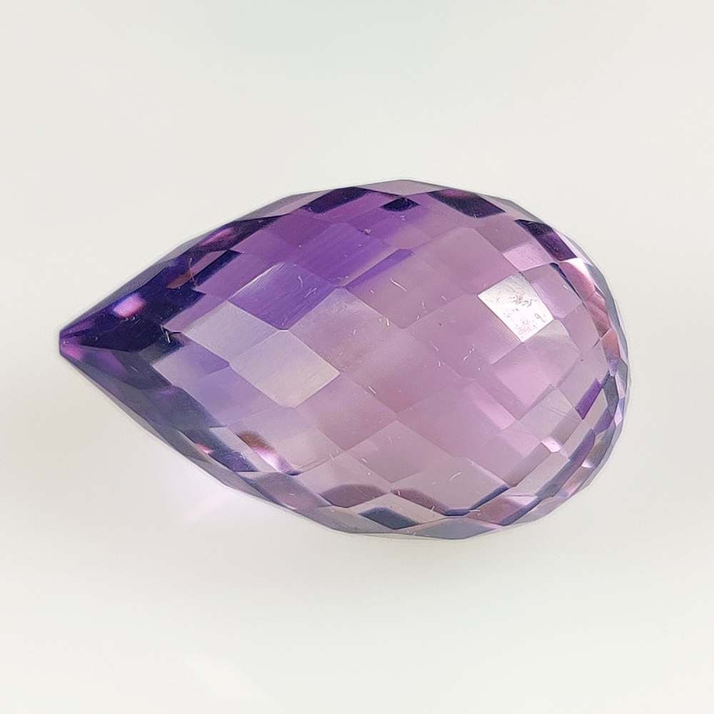18.29 Ct Natural Purple Amethyst Pear drop: Weight - 18.29 Ct / Dimensions - 19.60 x 12.40 x 12.40 mm / Shape - Pear Drop/ Color - Purple / Clarity - VVS / Origin -Brazil / Treatment - Heated