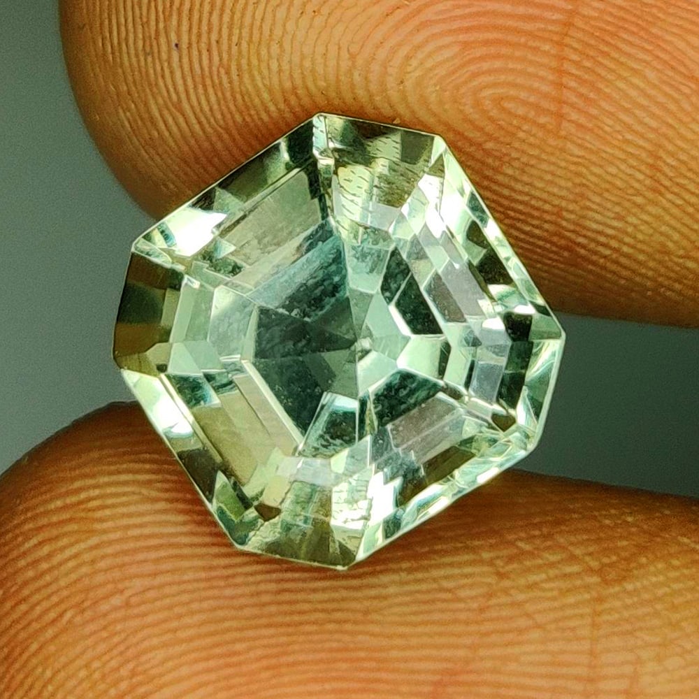 4.68 Ct Natural Green Amethyst Square Octagon Cut: Weight - 4.68 Ct / Dimensions - 10.00 x 10.00 x 7.60 mm / Shape - Square Octagon Cut / Color - Green / Clarity - VVS / Origin - Brazil / Treatment - Heated