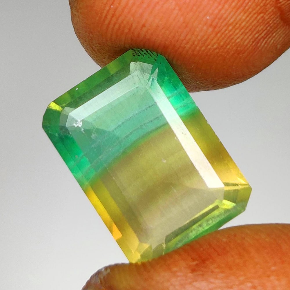 8.41 Ct Natural Blue John variety Flourite Octagon Cut: Weight - 8.41 Ct / Dimensions - 14.00 x 10.00 x 6.20 mm / Shape - Octagon Cut / Color - Multicolor / Clarity - VVS / Origin - Brazil / Treatment - None