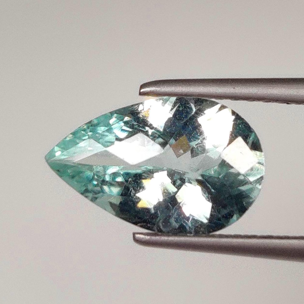 1.97 Ct Natural Aquamarine Pear Cut: Weight - 1.97 Ct / Dimensions - 11.90 x 7.70 x 5.00 mm / Shape - Pear Cut / Color - Water Blue / Clarity - SI / Origin -India / Treatment - Heated