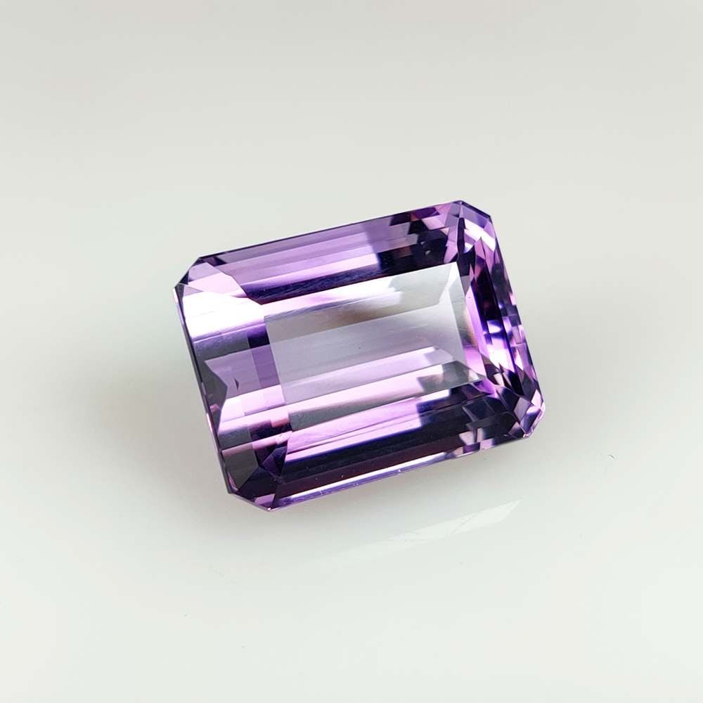25.69 Ct Natural Purple Amethyst Octagon Cut: Weight - 25.69 Ct / Size - 19.20 x 14.60 x 11.40 mm / Shape - Octagon Cut / Color - Purple / Clarity - VVS / Origin -Brazil / Treatment - Heated